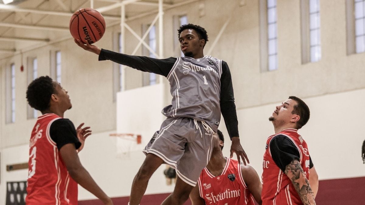 Player rises for a layup in a Showtime Sports NJ men's Silver division basketball game