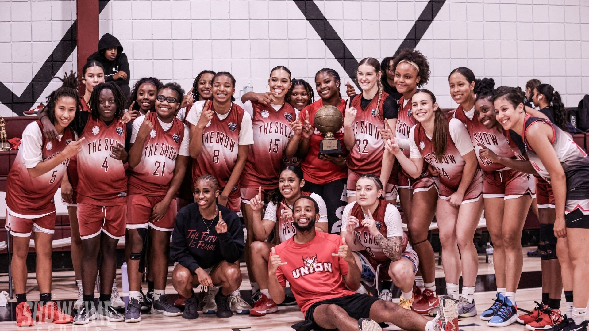 Showtime Sports NJ women's division champions celebrating with the trophy Showtime Sports NJ women's division champions celebrating with the trophy